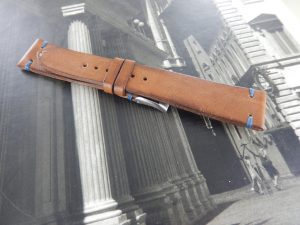 Brown leather with blu stitching hand made strap