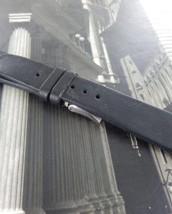 Black leather with white stitching hand made strap