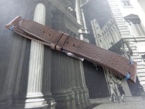 Dark brown leather with blu stitching hand made strap
