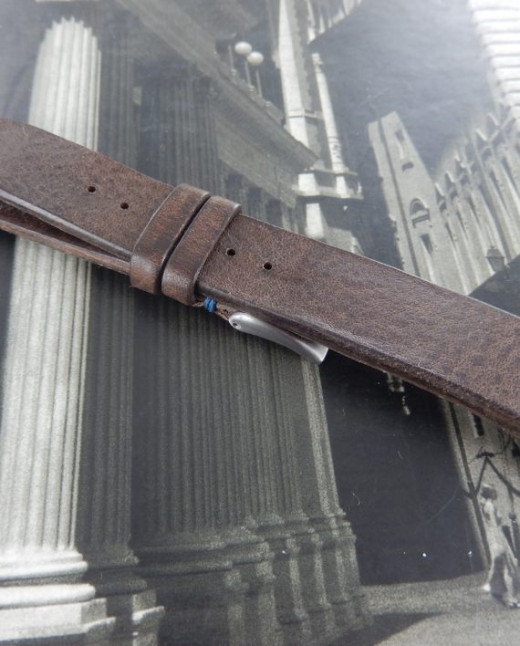 Dark brown leather with blu stitching hand made strap